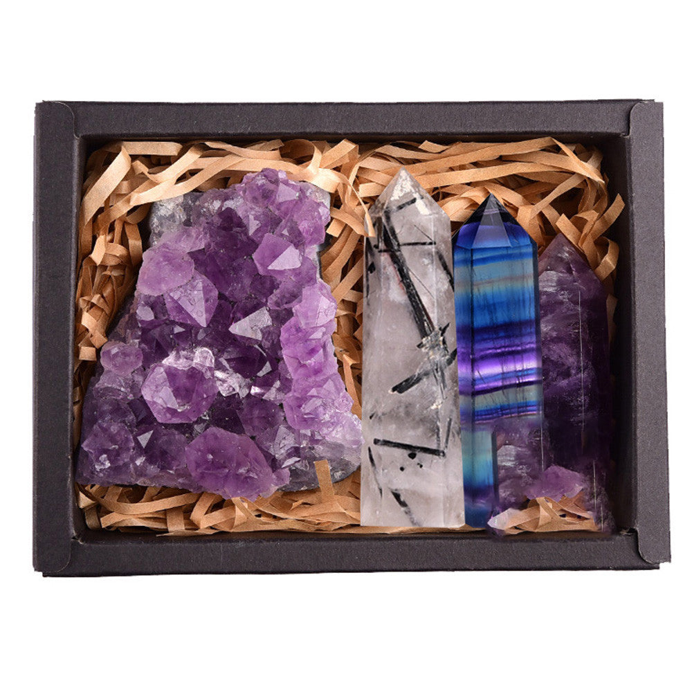 Amethyst crystal tower altar setup with candles crystals and sacred objects for daily spiritual practice