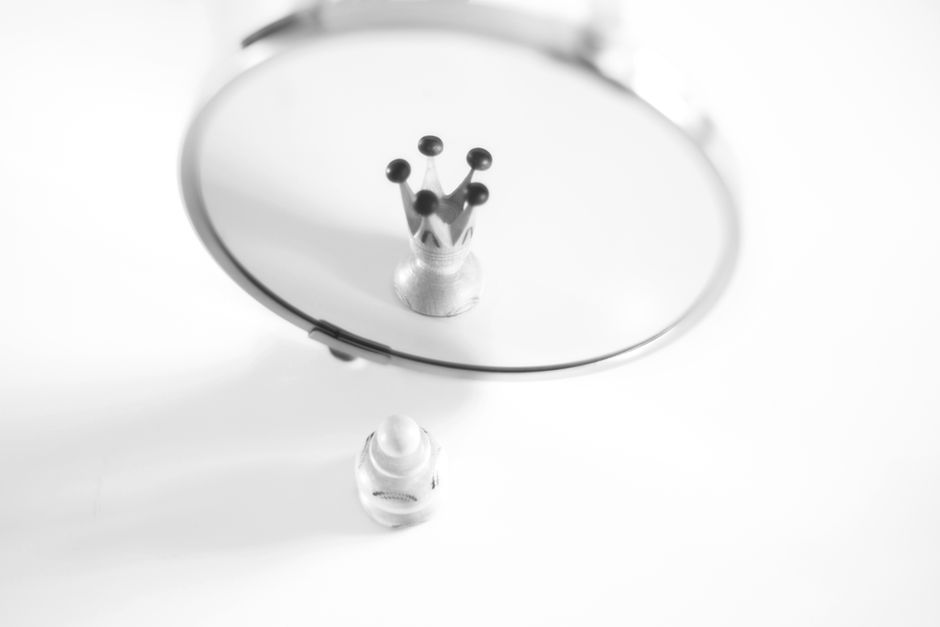 The Mirror as Psychological Threshold: How Reflective Surfaces Rewrite Self-Perception
