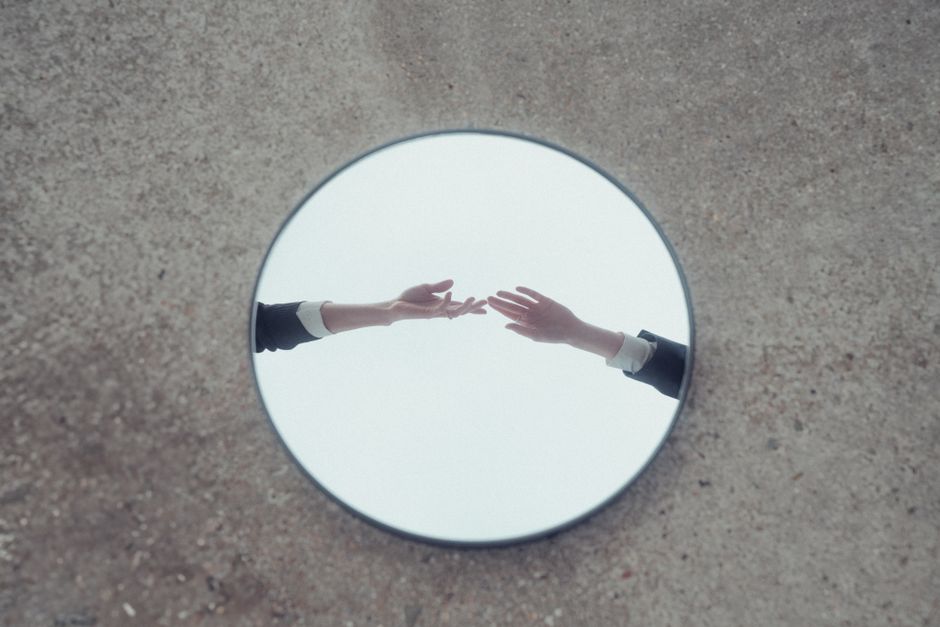 Does a Mirror Reflect the Self or Create It? The Philosophical Problem at the Heart of Mirror Magic
