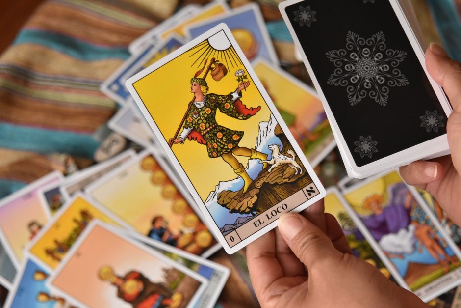 The World Card and the Fool's Return: What Tarot Actually Says About Endings That Begin Something
