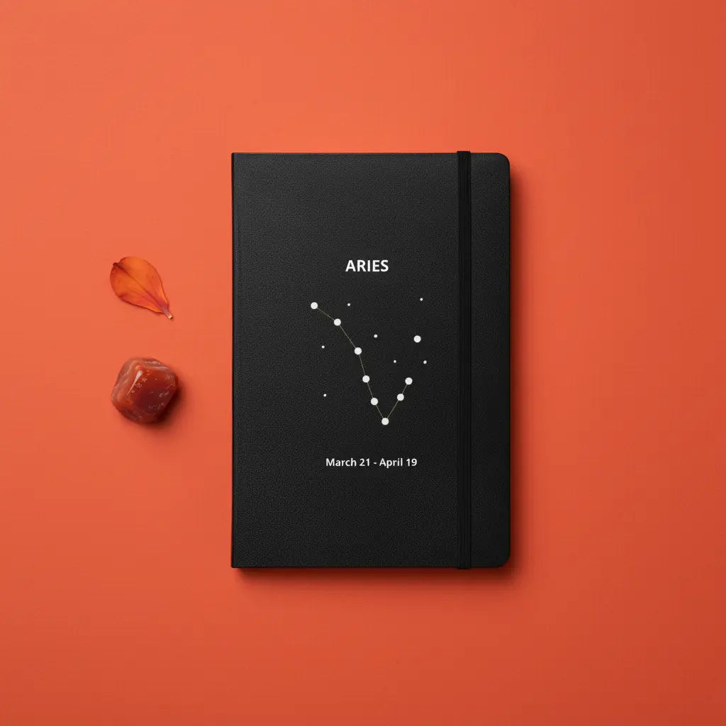 Aries Constellation Slim Black Notebook Flat Lay Fiery Bold Lifestyle Scene